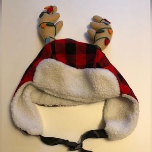Christmas hat with antler and Christmas lights.